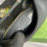 Side profile of elevated signature women's handbag – women's designer-style accessory
