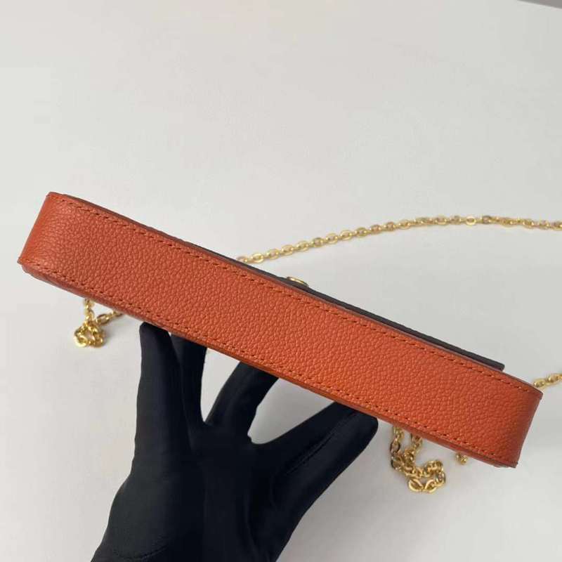 Styled lifestyle shot of classic sleek women's handbag – women's premium purse