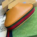 Styled lifestyle shot of classic statement women's handbag – women's luxury accessory