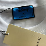 Flat lay presentation of Gucci luxury clothing with monogram-inspired silhouette