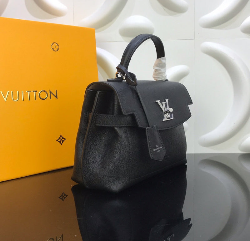 Close-up detail of polished signature women's handbag – women's designer-style accessory