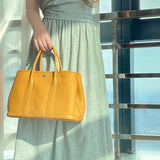 Side view of versatile structured handbag