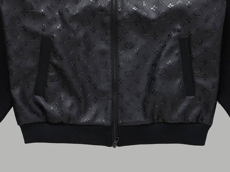 Flat lay presentation of Louis Vuitton luxury clothing with signature branding