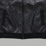 Flat lay presentation of Louis Vuitton luxury clothing with signature branding