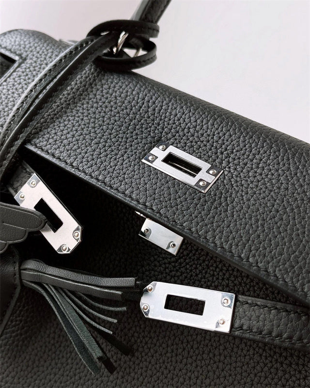  timeless top-handle bag styled with outfit