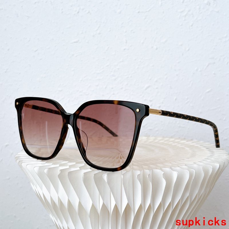 Close-up detail view of Louis Vuitton unisex sunglasses
