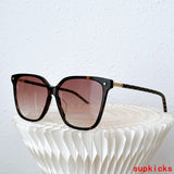 Close-up detail view of Louis Vuitton unisex sunglasses