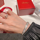 Front view of Cartier unisex jewelry piece
