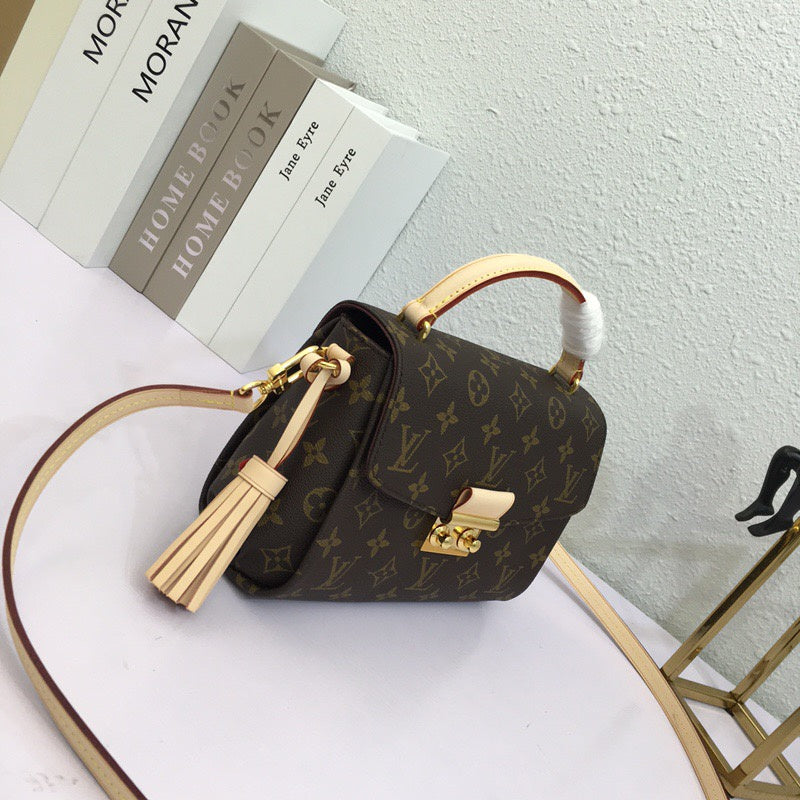 Close-up detail of structured refined women's handbag – women's premium purse