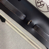 Close-up detail of understated bag design