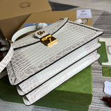 Styled lifestyle shot of structured classic women's handbag – women's premium purse