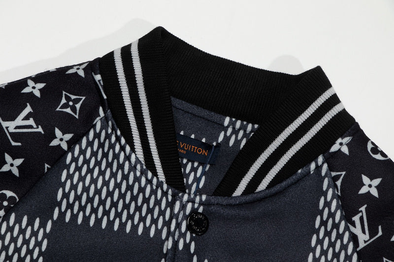 Flat lay presentation of Louis Vuitton luxury clothing with signature branding