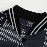 Flat lay presentation of Louis Vuitton luxury clothing with signature branding