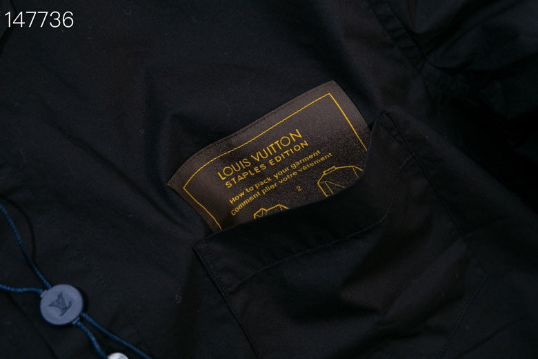 Full styled look of Louis Vuitton luxury clothing with monogram-inspired silhouette