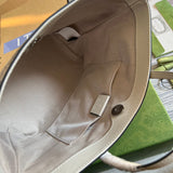 Side profile of premium chic women's handbag – women's luxury accessory
