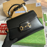 Front view of polished refined women's handbag – women's designer-style accessory