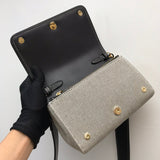 Ziva's Charm handbag – carry view (one versatile size)