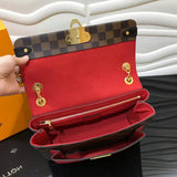 Close-up detail of statement polished women's handbag – women's luxury accessory