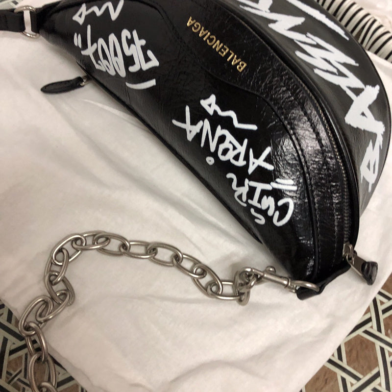Back view of sleek structured women's handbag – women's luxury handbag