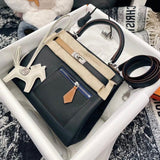 Side view of refined structured handbag