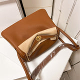  Timeless top-handle bag carried on shoulder 10