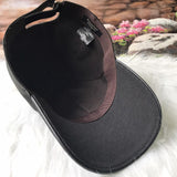Side view of Burberry unisex cap