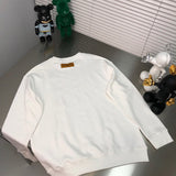 Front view of Louis Vuitton luxury clothing with monogram-inspired silhouette
