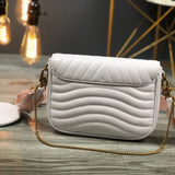 Close-up detail of sleek chic women's handbag – women's luxury accessory