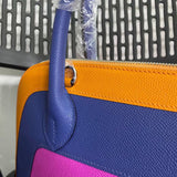 Close-up detail of statement bag design