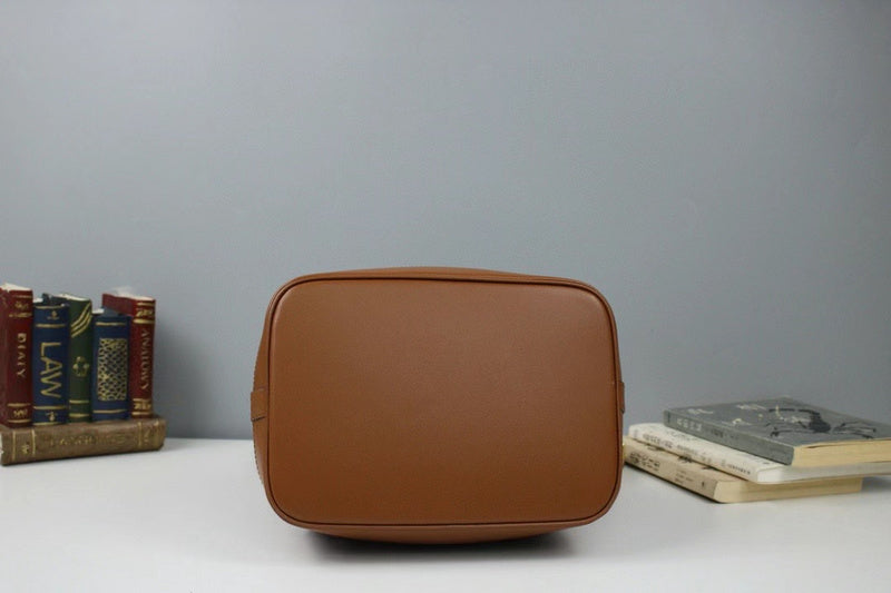 Styled lifestyle shot of chic refined women's handbag – women's premium purse