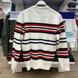 Side profile of Lacoste luxury clothing with monogram-inspired silhouette
