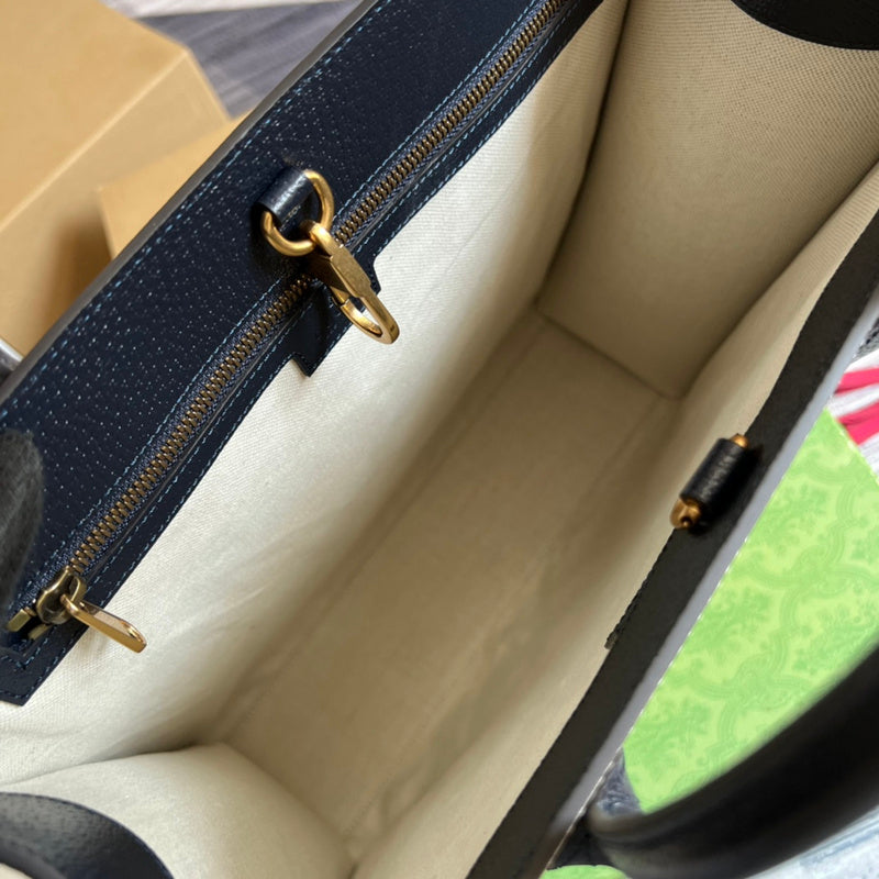 Side profile of signature everyday-luxe women's handbag – women's designer-style accessory