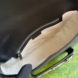 Styled lifestyle shot of polished chic women's handbag – women's premium purse