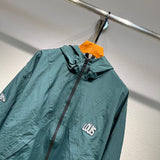 Full styled look of Louis Vuitton luxury clothing with label-forward styling