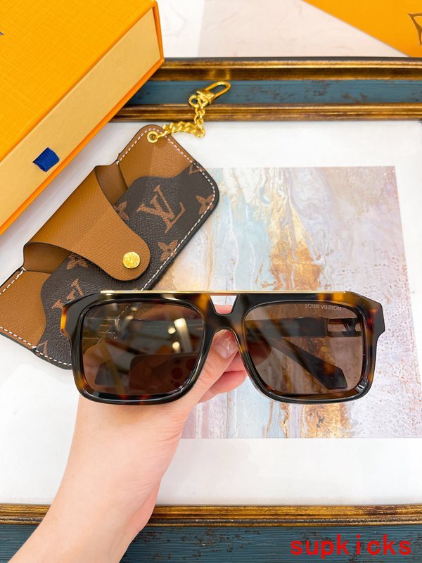 Close-up detail view of Louis Vuitton unisex sunglasses