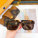 Close-up detail view of Louis Vuitton unisex sunglasses