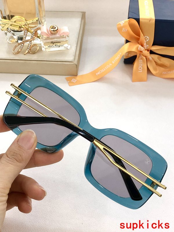 Close-up detail view of Louis Vuitton unisex sunglasses