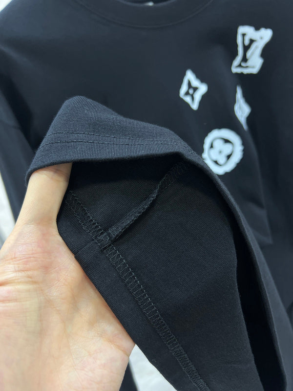 Side profile of Louis Vuitton luxury clothing with logo-detail design