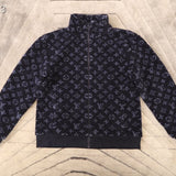 Flat lay presentation of Louis Vuitton luxury clothing with tailored silhouette
