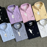 Close-up detail shot of Lacoste luxury clothing with logo-detail design