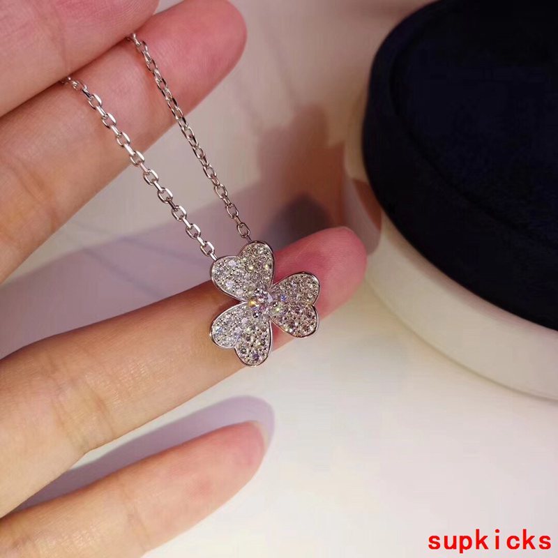 Lifestyle view of Van Cleef & Arpels unisex jewelry piece