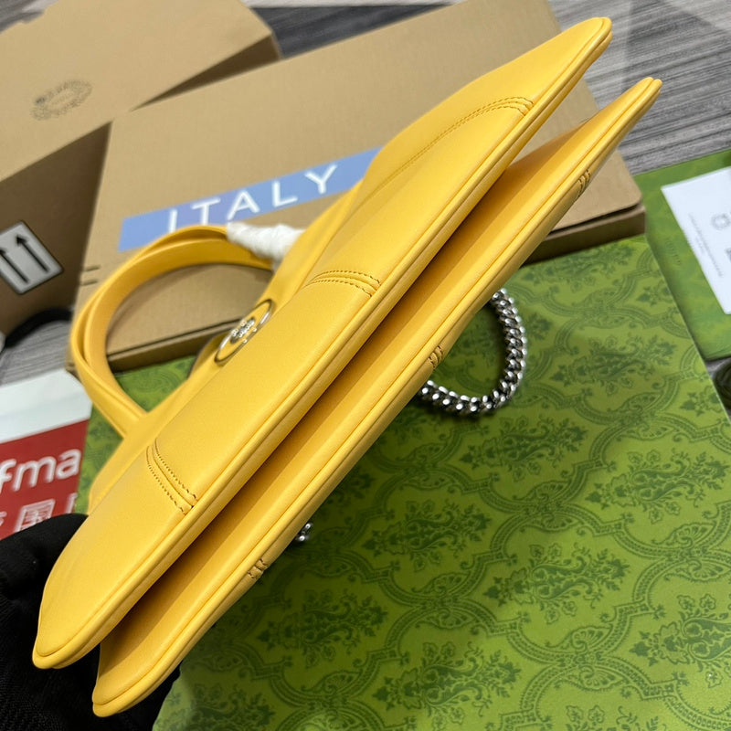 Styled lifestyle shot of chic signature women's handbag – women's luxury accessory