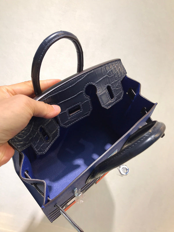 Side view of minimalist structured handbag