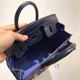 Side view of minimalist structured handbag