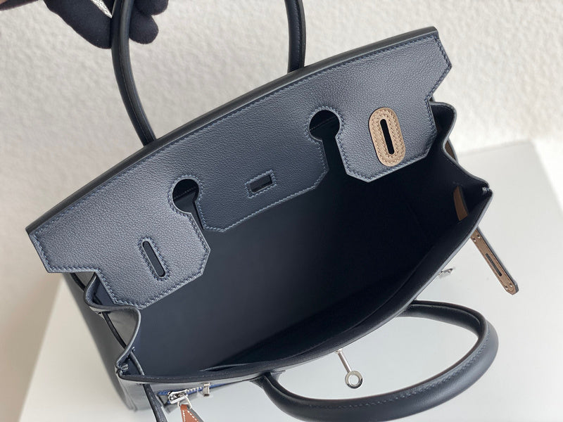 Side view of timeless structured handbag
