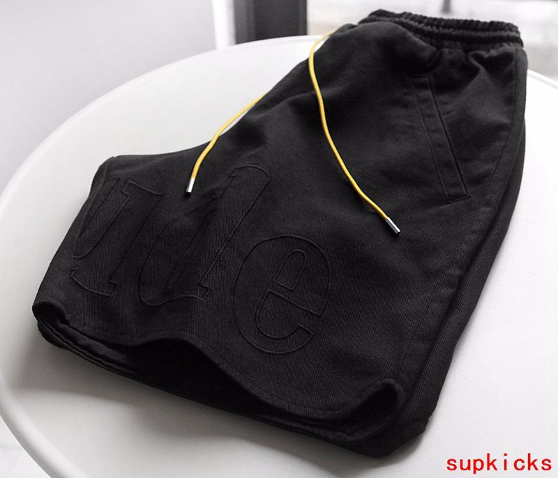 Front view of Rhude luxury clothing with everyday silhouette