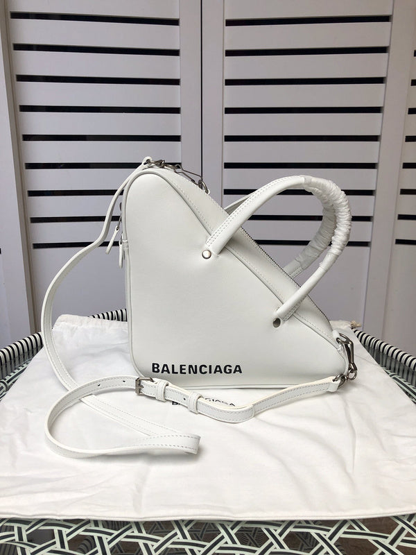 Front view of chic polished women's handbag – women's designer-style accessory