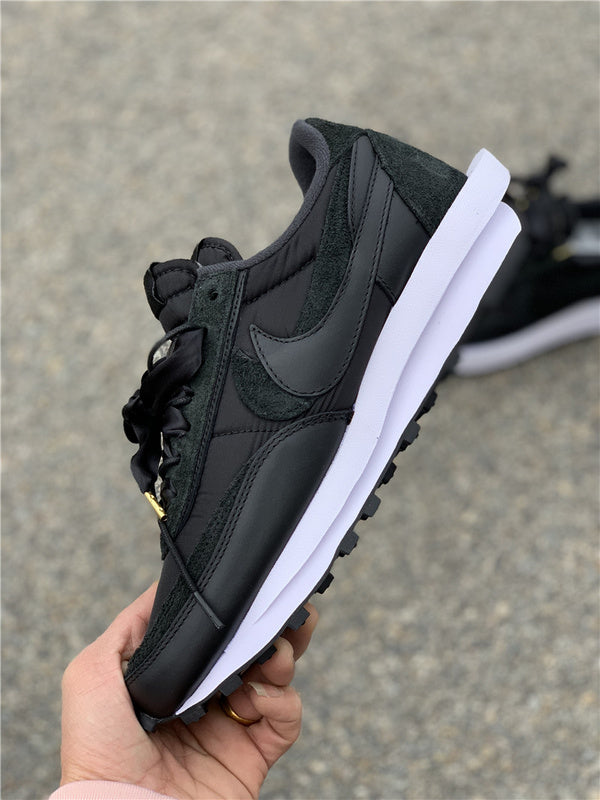 Nike Men's & Women's Premium Low-Top Trainers — Style 025 angle view