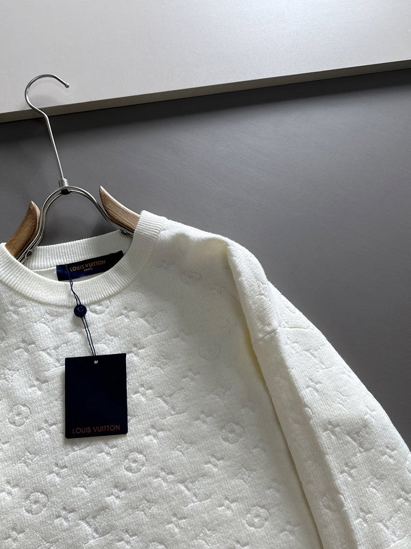 Full styled look of Louis Vuitton luxury clothing with logo-detail design
