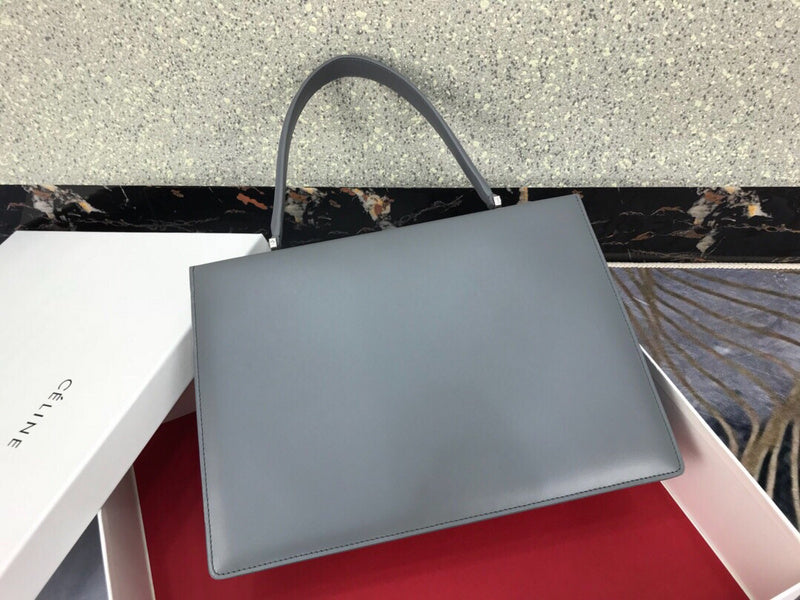 Styled lifestyle shot of signature elevated women's handbag – women's luxury handbag